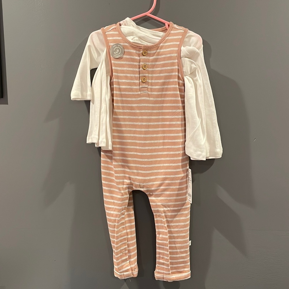 Never worn 3 long sleeve white onsies and pink striped romper